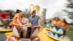 Students in tea cup ride